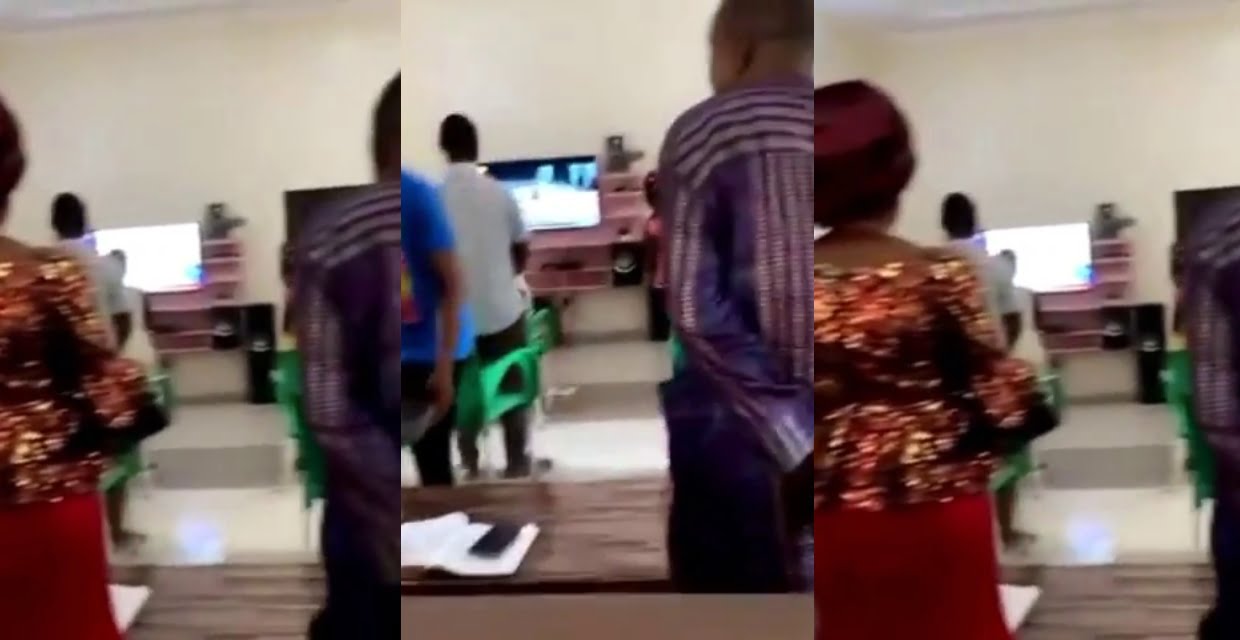 Mother Takes Offertory After Holding Sunday Service At Home With Her Children - Video