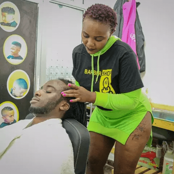 See What This Curvaceous Female Barber Wears While Attending To Male Clients