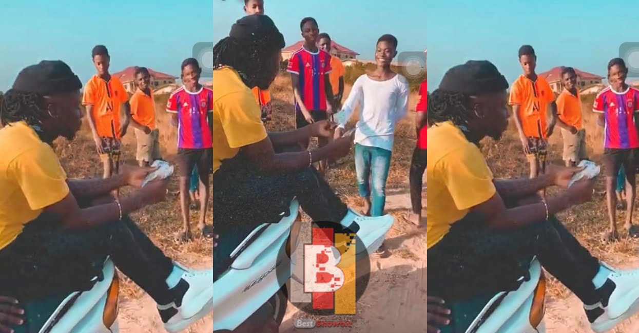 Stonebwoy dashes GHC100 notes to street boys - Video