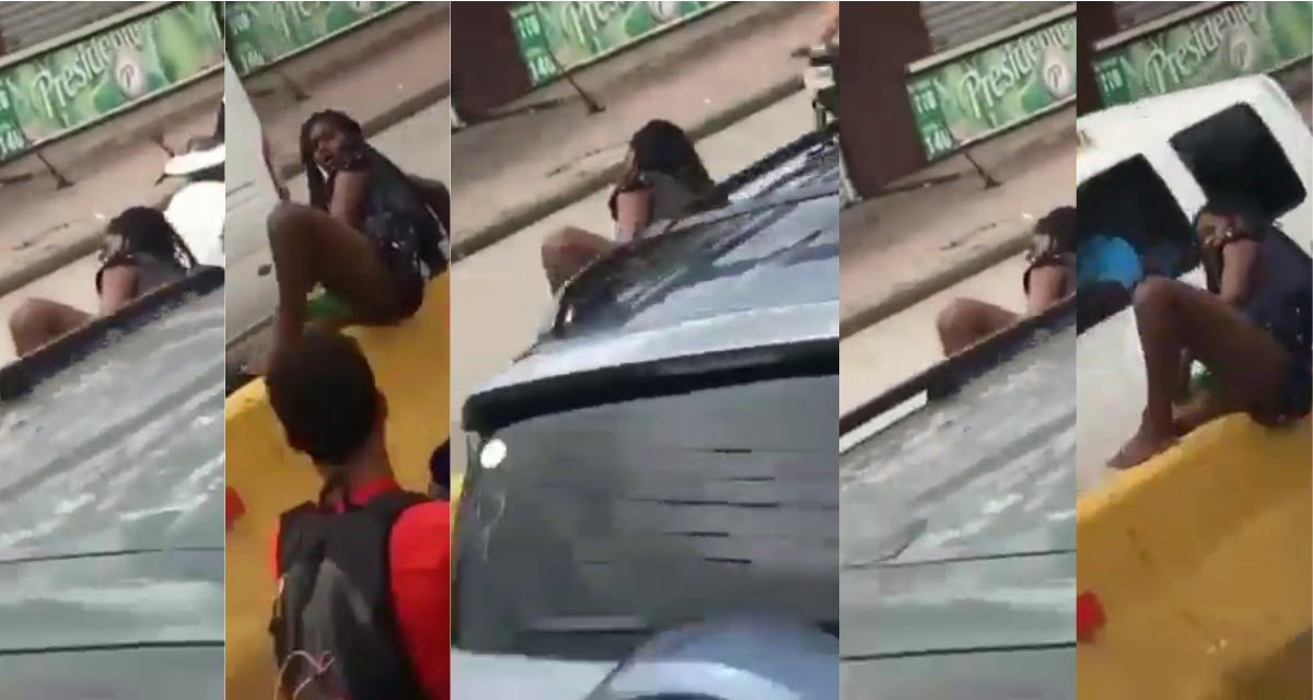 Young lady use a beer bottle to 'Do' the 'thing' in the middle of a highway (video)