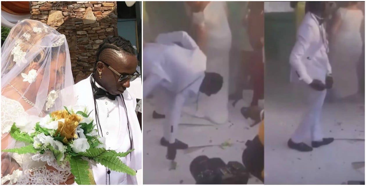 Patapaa disgraces himself at his own wedding as he picks money sprayed on him from the floor (video)