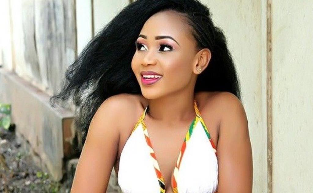 Akuapem Poloo helps a homeless boy she spotted sleeping at the side of the road (video)