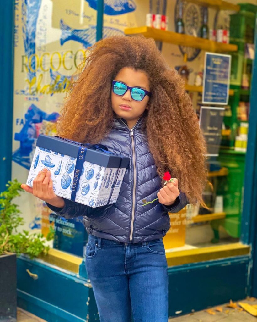Meet 8 years old Ghanaian boy with the longest hair in the world. (photos)