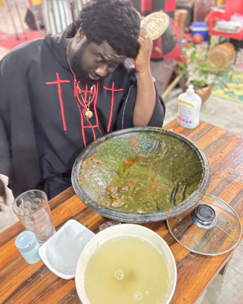 Chop bar pastor, Ajagurajah consumes full bowl of Banku in new photos