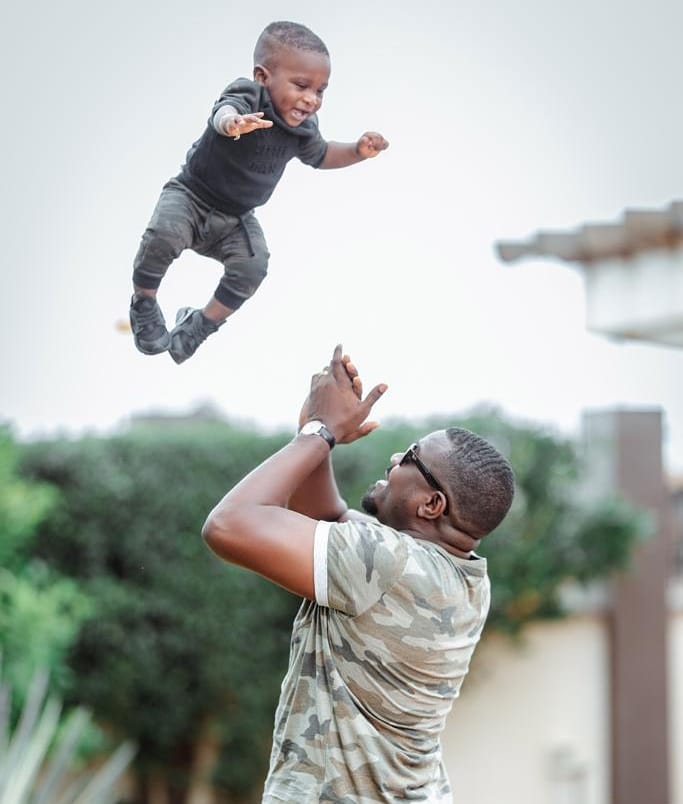 New photos of John Dumelo's son looking handsome and tall surfaces