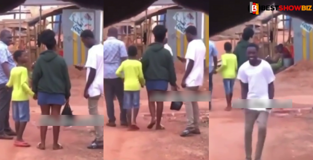 Video of a young boy boldly taking the number of a lady walking with her father surfaces