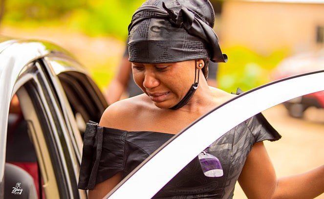 Sad scenes: Akuapem Poloo and her mother break down in tears at her father's funeral