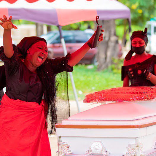 Sad scenes: Akuapem Poloo and her mother break down in tears at her father's funeral