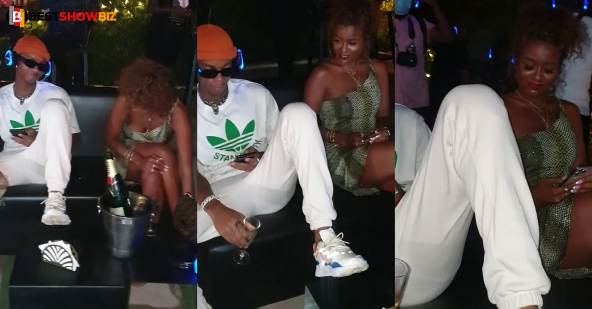 kidi spotted with his new girlfriend chilling at a night club (video)