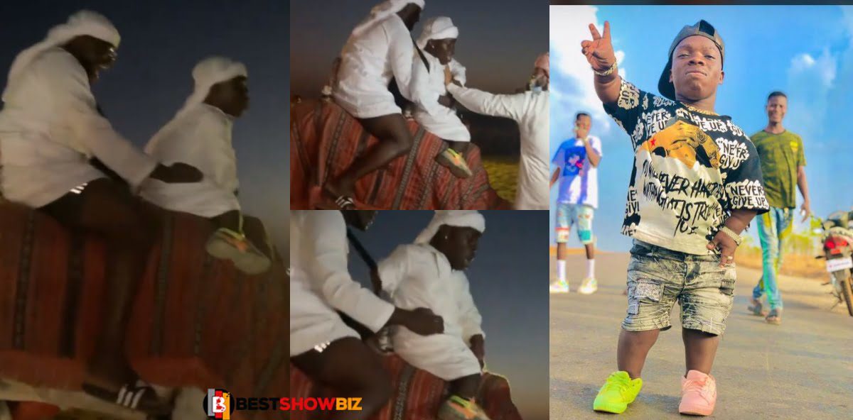 "I'm scared, I want to get down" - 'Fearo' Shatta Bandle cries as he goes on a camel ride in Dubai (video)