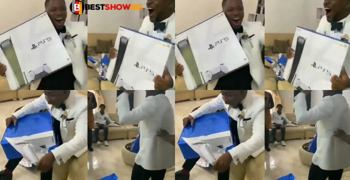 groom jumps with delight after his new bride gave him a PlayStation 5 on their wedding day (video)