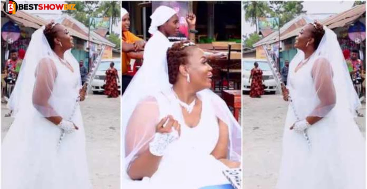 "I have money; please marry me"- Woman hit the streets in wedding gown in search of a husband (video)