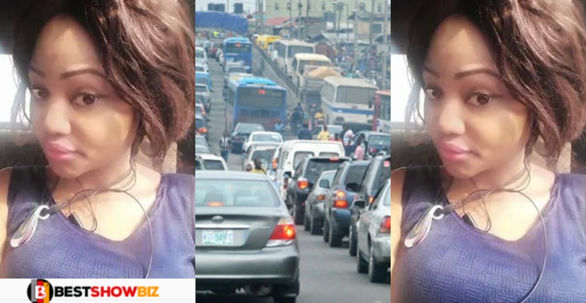 Lady gets k!ssed in traffic by stranger after she pulled her head out to get fresh air