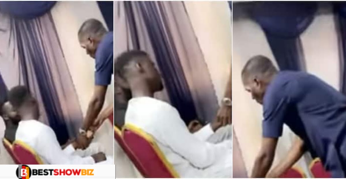 Video: Wahala as two men refuses to give their phones to usher after they were caught pressing it during church service