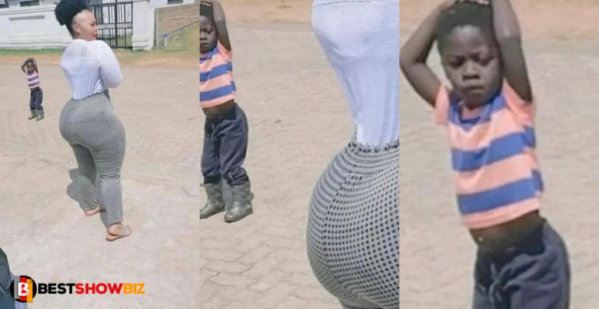 Little Boy in shock after seeing the huge backside of a lady (Photos)