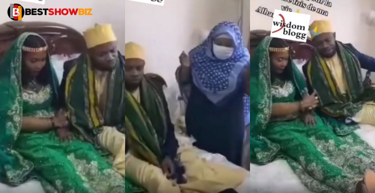Groom cries like a baby after his mother and relatives escorted him into the bedroom to chop his new wife (video)