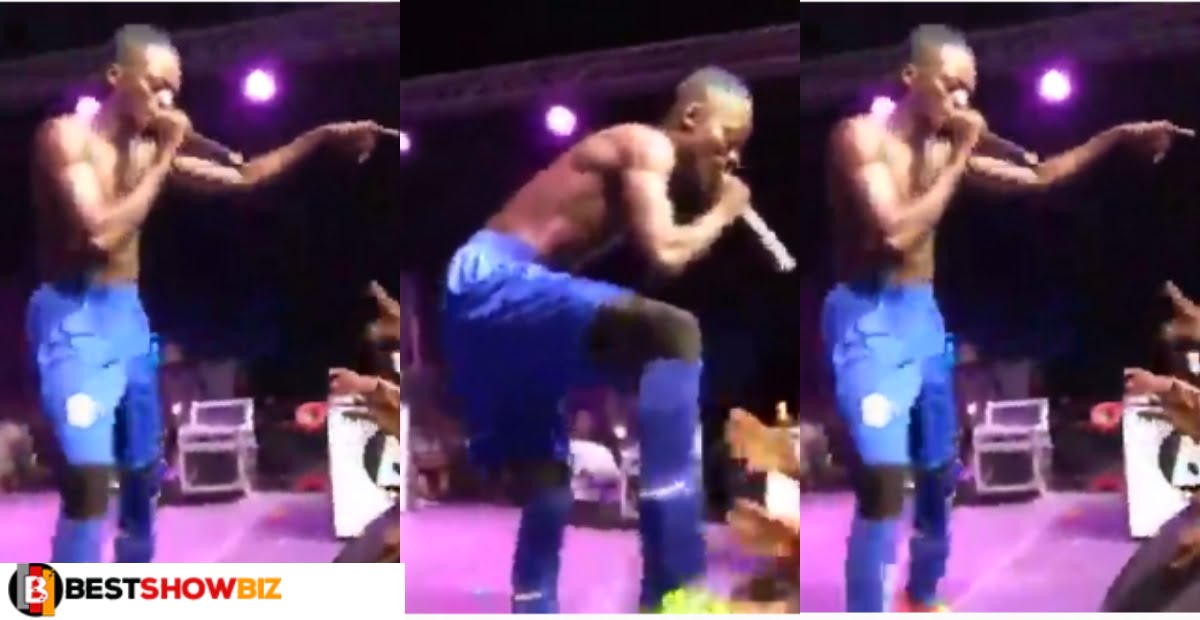 Fan caught trying to steal lil win's phone whiles he was performing on stage (video)