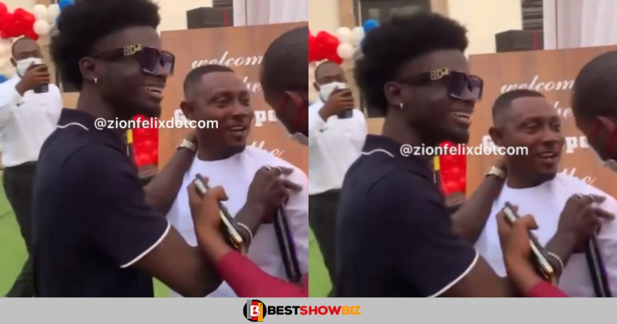 fan disgraced after he was dragged away like a thief for trying to give Kuami Eugene A Hug In Public (video)