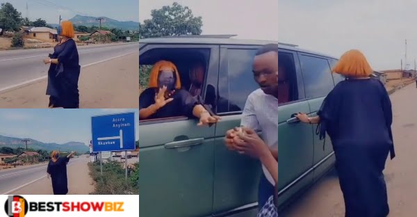 Nana Ama McBrown stops in the middle of road to rain money on people in Eastern Region (video)