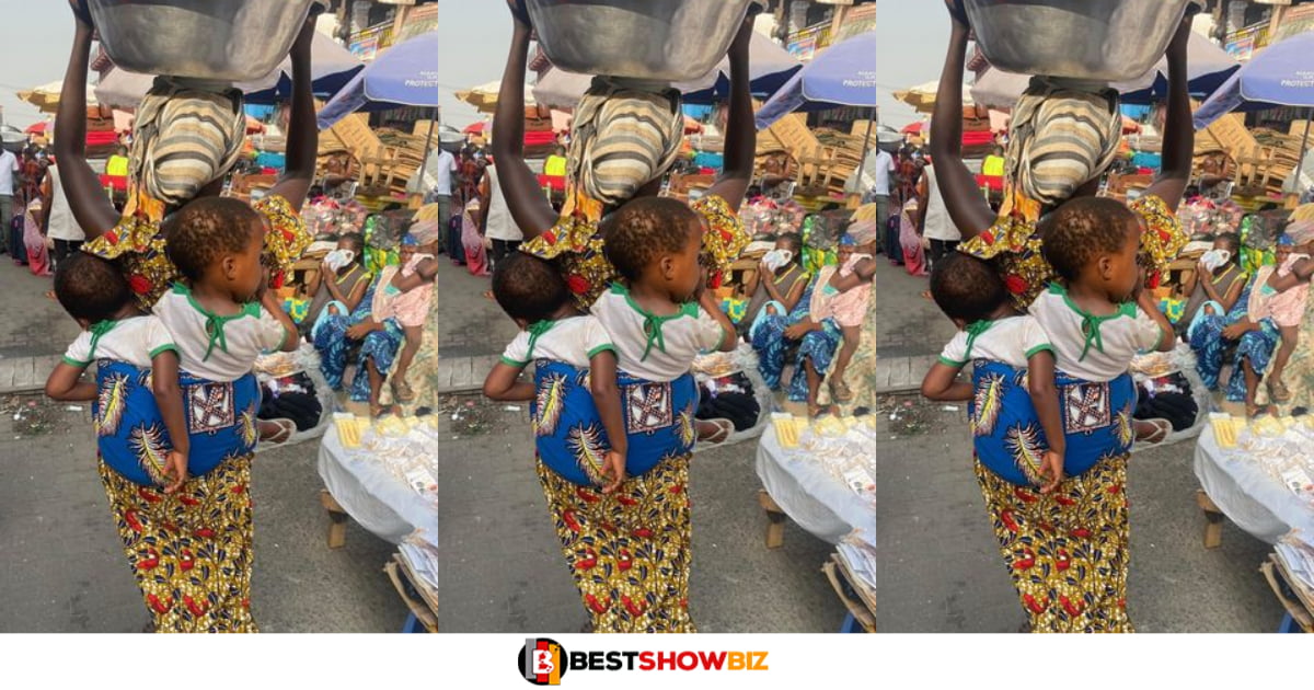 (Mothers are the best) see photo of a hardworking mother carrying load with twins strapped at her back