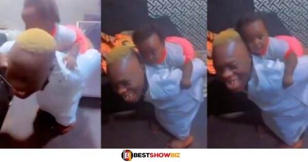 Watch Hilarious Video Of Shatta Bandle Babysitting His Daughter (video)