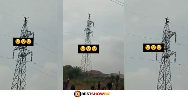W!tch caught on camera stranded on a high tension pole after failing to get home in the morning.