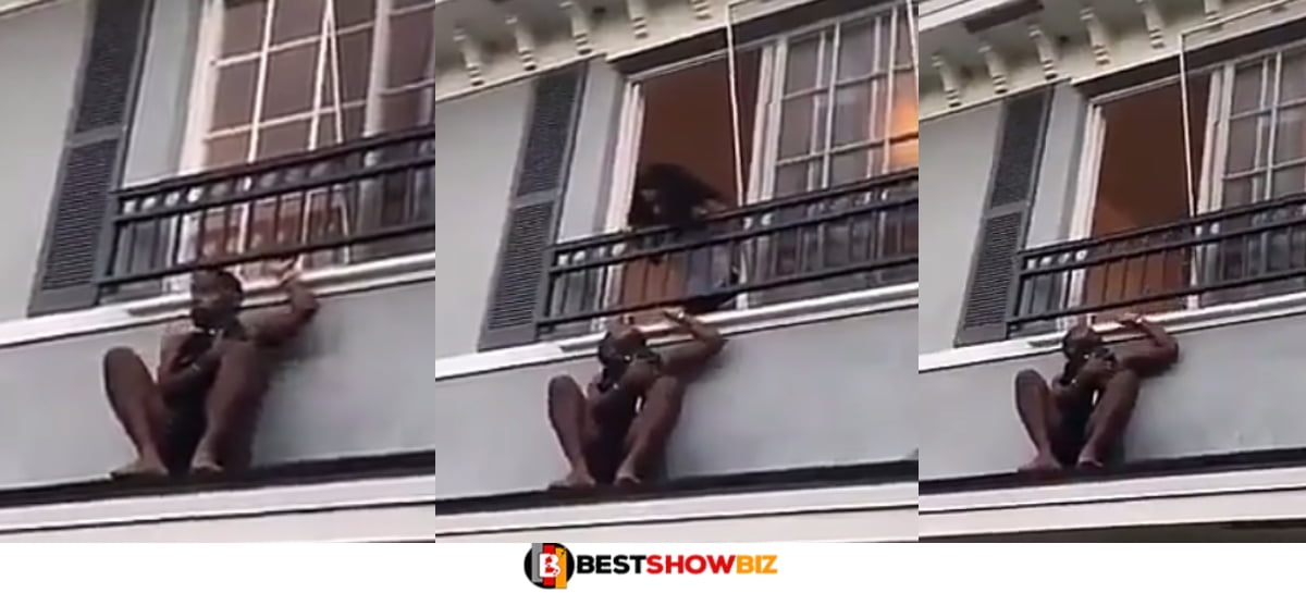 (Video) Man trapped on rooftop after husband of the woman he was chopping entered the bedroom