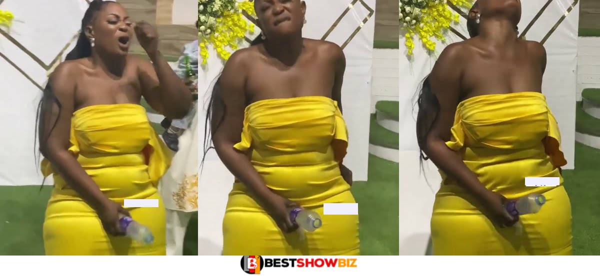 (VIDEO) Slay Queen Caught Using a Bottle On Her 'Duna' At A Wedding Reception