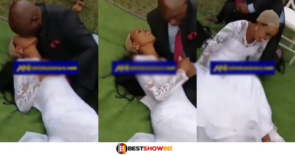 Bride's wig falls off as her husband k!sses her at their wedding (video)