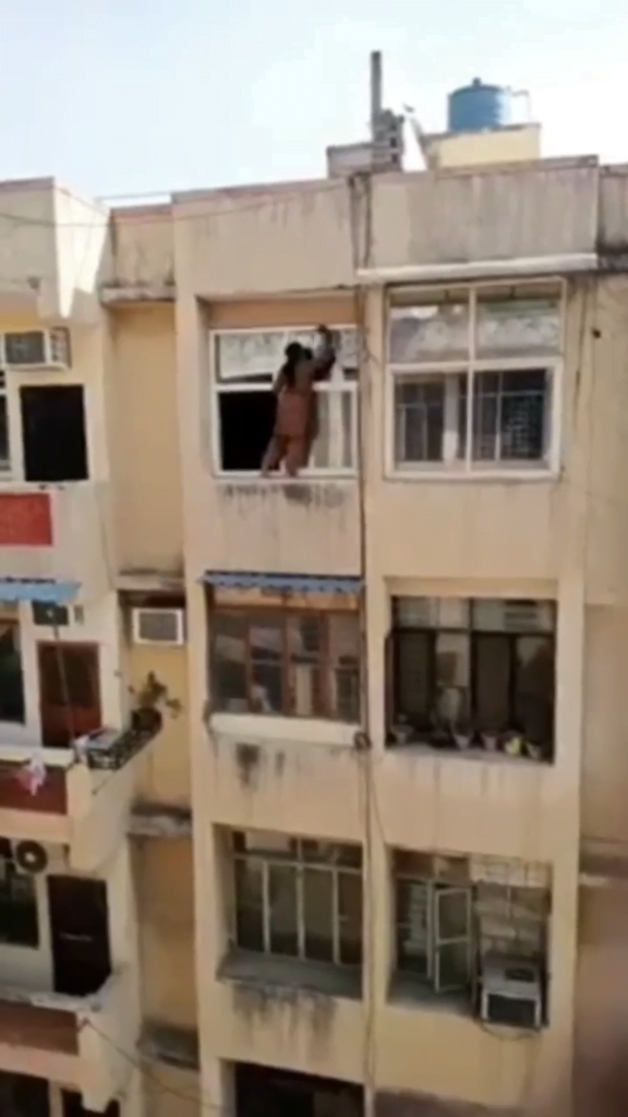 “Wife Material”: Reaction As House Wife Spotted Cleaning The Window On A 4th Floor (Video)