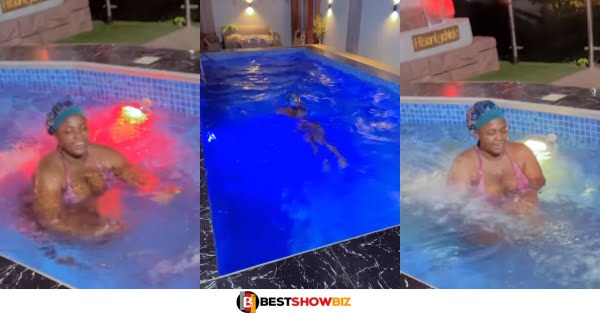 Tracey Boakye displays her front assets as she is spotted swimming in a pool