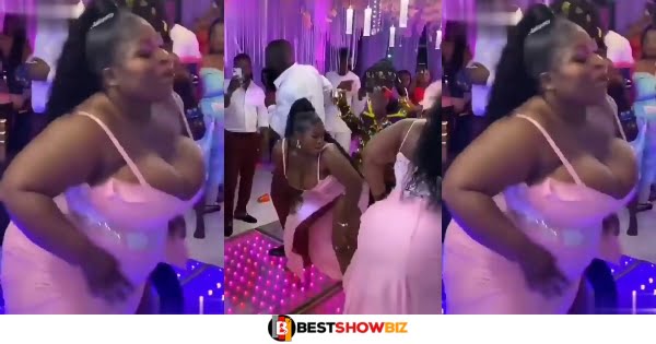 Bridesmaids with big melons steal show at wedding reception as her melons nearly falls