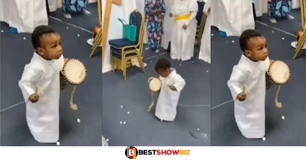 He’s Serving God - Reactions As Little Boy in White Dress Drumming During Praises Session in Church (Video)