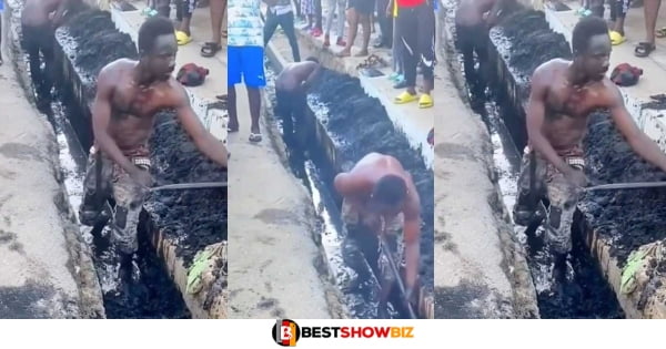 Two Thieves Made To Clean A Dirty Gutter After They Were Caught (Video)
