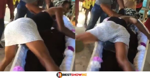 Slay queen spotted tw3rking on the dead body of a play boy during his burial (video)