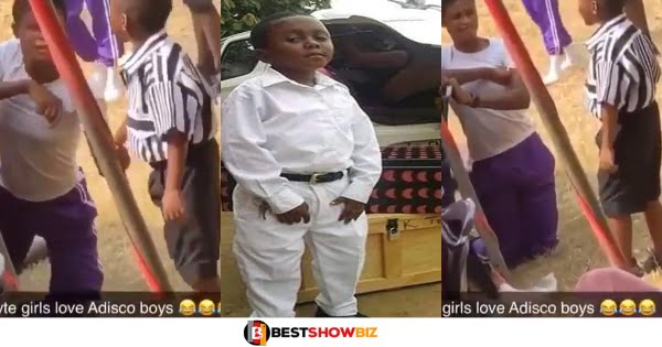 The shortest student at Adisadel College Elvis, spotted toasting a female student (watch video)