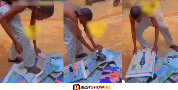 Ego Reach Everybody - Young Man destroys portraits of himself and girlfriend after broken heart (Video)