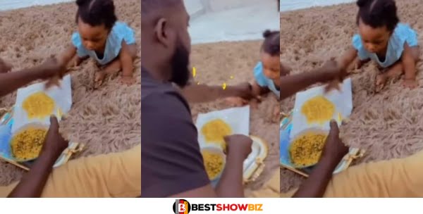 Funny Video As Man Throws Baby’s Hand Away From Eating His Eba Food