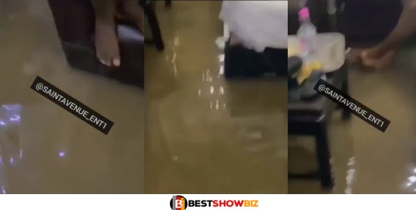 "How will they enjoy" - Men cries out as their hotel room gets flooded after heavy rainfall (Video)