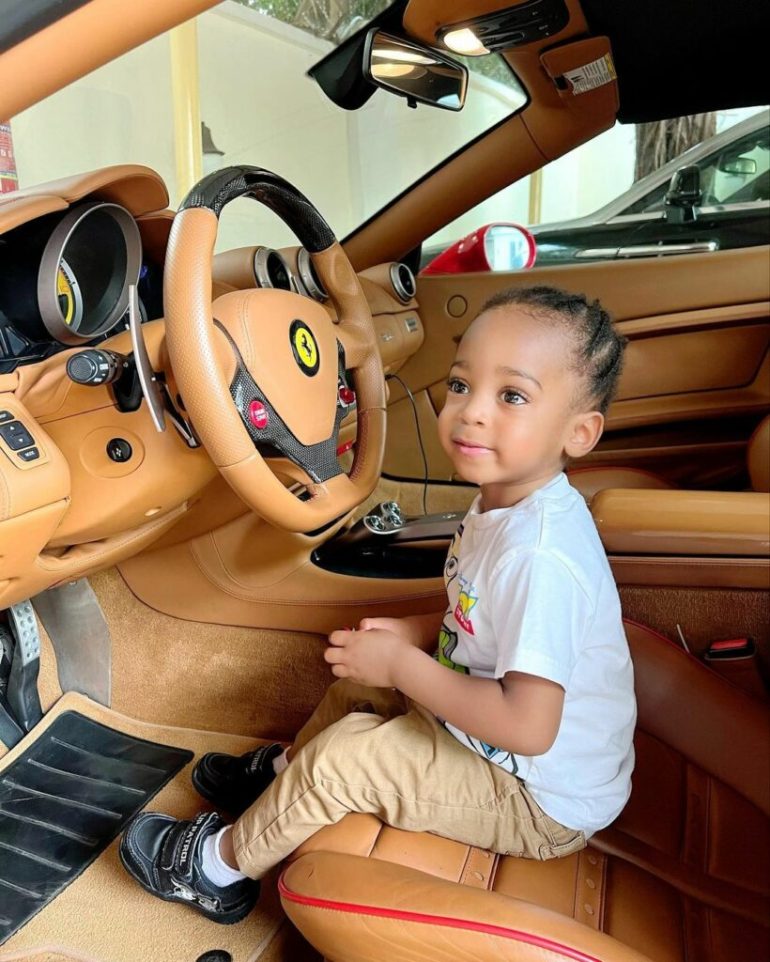 New Photos of Regina Daniels's Son Captured ‘Driving’ His Father’s Expensive Ferrari Surfaces