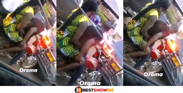 (Video) Okada man caught on camera romancing a Female Passenger While In Traffic