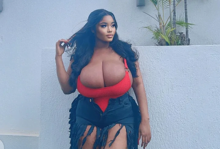 Ada La Pinky Displays Her Heavy Melons In New Photos As She Dazzles In Red Outfit