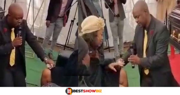 Watch the strange moment a man proposed marriage to his girlfriend at her father's funeral (video)
