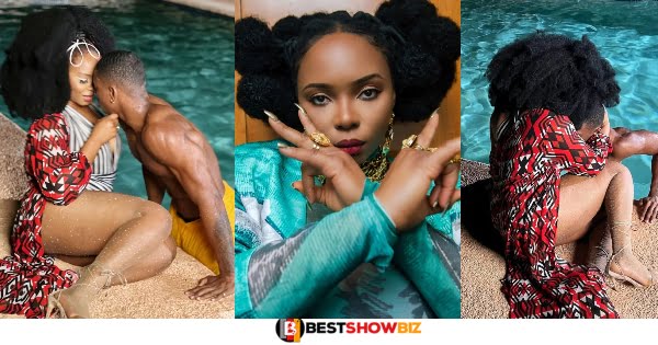 Popular Nigerian Singer Yemi Alade Spotted Chopping Love With A Man In A Swimming Pool
