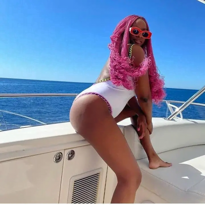 Popular Nigerian DJ, Cuppy Puts Her Bunging Body on Display in a Hot Bikini Outfit inside Pool