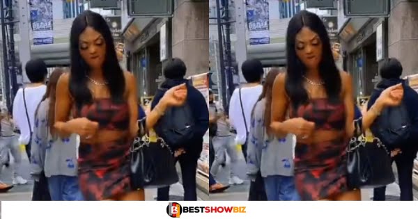Tall Lady in Short Dress Storms The Street And Twerks In New Video