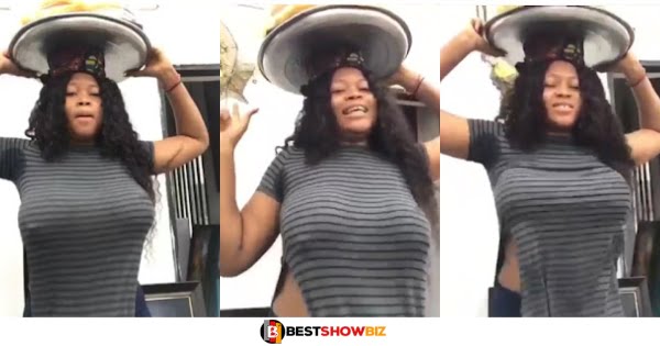 Lady selling on the streets with her bra cause confusion online (watch video)
