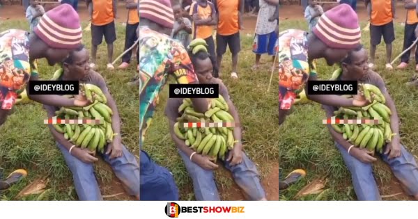 Community members force a thief to eat the full bunch of unripe plantains he stole (watch video)
