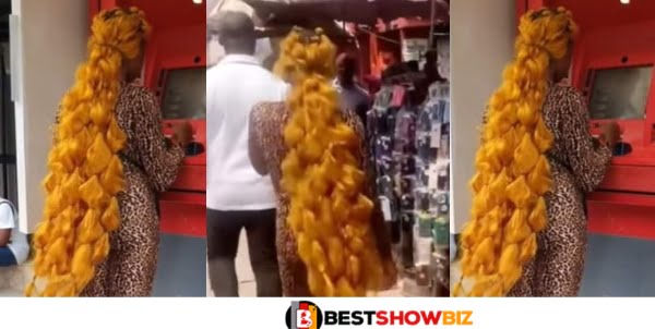 Lady With A Strange Hairstyle Causes Trafic in Market (Video)