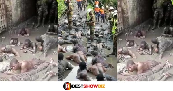 VIDEO: Soldiers Forces Galamsey In Obuasi To Sleep In Muddy Water After Arresting Them